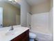 Clean bathroom with vanity, mirror, and bathtub/shower combination at 8830 Beaver Creek Dr, Charlotte, NC 28269