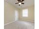 Bedroom with carpeted floor, ceiling fan and natural light from window at 8830 Beaver Creek Dr, Charlotte, NC 28269