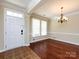 Bright, open dining area featuring hardwood floors, a chandelier, and great natural light at 8830 Beaver Creek Dr, Charlotte, NC 28269