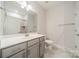 Bathroom with a vanity, sink, modern fixtures, toilet, and a shower at 1005 Headwaters Ct, Matthews, NC 28104