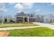 Inviting single-Gathering home with a well-maintained lawn and appealing curb appeal at 1005 Headwaters Ct, Matthews, NC 28104