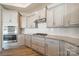 Modern kitchen featuring shaker cabinets, granite countertops, and stainless steel appliances at 1005 Headwaters Ct, Matthews, NC 28104