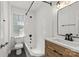 Updated bathroom boasts white subway tile, modern fixtures, and a new vanity at 108 Colville Rd # 21B, Charlotte, NC 28207