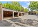 A long line of individual carports offers shaded parking at 108 Colville Rd # 21B, Charlotte, NC 28207