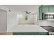 Open living area featuring a kitchen, ceiling fan and natural light at 108 Colville Rd # 21B, Charlotte, NC 28207