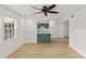 Bright and airy living area with modern flooring and an open view of the kitchen at 108 Colville Rd # 21B, Charlotte, NC 28207