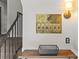 Interior view of mailboxes with a small table and staircase nearby at 108 Colville Rd # 21B, Charlotte, NC 28207