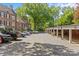 A long line of individual carports offers shaded parking at 108 Colville Rd # 21B, Charlotte, NC 28207