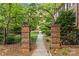 Iron gate at the entrance to a well-maintained property at 108 Colville Rd # 21B, Charlotte, NC 28207