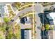 An overhead shot showcasing a modern home in a well-planned community with mature trees and streetscapes at 111 W Poindexter Dr, Charlotte, NC 28203