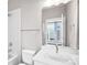 Well-lit bathroom features a shower with white subway tiles, and a stylish vanity at 111 W Poindexter Dr, Charlotte, NC 28203
