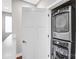 Convenient laundry area with stacked washer and dryer units, maximizing space and efficiency at 111 W Poindexter Dr, Charlotte, NC 28203