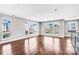 Bright living area with hardwood floors and large windows providing natural light at 111 W Poindexter Dr, Charlotte, NC 28203