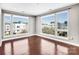 Bright and spacious living room with large windows and hardwood floors overlooking a beautiful view at 111 W Poindexter Dr, Charlotte, NC 28203