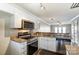 Modern kitchen with stainless steel appliances, granite countertops, and ample cabinet space, perfect for cooking at 1224 Green Oaks Ln # I, Charlotte, NC 28205