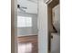 Modern laundry room next to bedroom provides convenience with a stacked washer/dryer unit and bedroom access at 1224 Green Oaks Ln # I, Charlotte, NC 28205