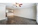 Spacious living room highlighting sleek flooring and neutral wall tones at 1224 Green Oaks Ln # I, Charlotte, NC 28205