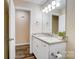 Bathroom features a granite countertop, white vanity, and modern fixtures at 124 Washington St, York, SC 29745