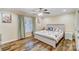 Bedroom with a white bed frame, ceiling fan, and lots of natural light at 124 Washington St, York, SC 29745