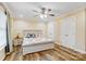 Bedroom with a white bed frame, ceiling fan, and dual closets at 124 Washington St, York, SC 29745