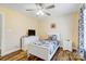 Bedroom with a single bed, a ceiling fan, and modern furnishings at 124 Washington St, York, SC 29745