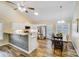 Bright and airy dining area with a vaulted ceiling, white cabinetry, and stainless steel appliances at 124 Washington St, York, SC 29745