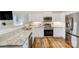 Well-equipped kitchen boasting granite countertops, stainless steel appliances, and ample cabinet space at 124 Washington St, York, SC 29745