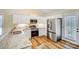 Spacious kitchen featuring modern stainless steel appliances, granite countertops, and lots of storage at 124 Washington St, York, SC 29745