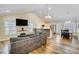 Open-concept living space featuring a fireplace, modern decor, and lots of natural light at 124 Washington St, York, SC 29745