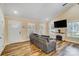 Living room with vaulted ceiling, a decorative fireplace, and lots of natural light at 124 Washington St, York, SC 29745