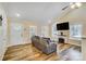 Living room with vaulted ceiling, a decorative fireplace, and lots of natural light at 124 Washington St, York, SC 29745