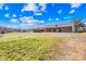 Exterior view of the barn with a fenced in pasture at 12613 Oak Grove Rd, Stanfield, NC 28163