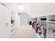 Spacious walk-in closet features custom shelving, ample storage, and bright lighting at 12613 Oak Grove Rd, Stanfield, NC 28163