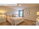 Cozy bedroom featuring plush bedding, soft lighting and a serene atmosphere at 1325 Secrest Commons Dr, Monroe, NC 28112