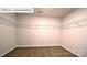 Large walk-in closet featuring ample storage space with installed shelving units at 1325 Secrest Commons Dr, Monroe, NC 28112