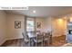 Dining room with wood floors and kitchen entrance at 1325 Secrest Commons Dr, Monroe, NC 28112