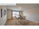 Bright dining area features a charming round table and natural light from the window at 1325 Secrest Commons Dr, Monroe, NC 28112