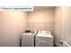 Laundry area with washer and dryer, plus wire shelving at 1325 Secrest Commons Dr, Monroe, NC 28112