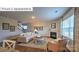 Spacious living room with hardwood floors, a fireplace, comfortable seating and a stairway at 1325 Secrest Commons Dr, Monroe, NC 28112