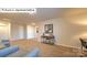 Cozy living room provides ample space, neutral tones, and a comfortable seating area with a workspace at 1325 Secrest Commons Dr, Monroe, NC 28112