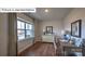 Bright office with a large window, hardwood floors, stylish decor and a functional workspace at 1325 Secrest Commons Dr, Monroe, NC 28112
