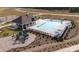 Aerial view of the community pool, clubhouse, playground and common area at 1344 Secrest Commons Ct, Monroe, NC 28112