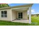 Covered outdoor patio with sliding glass doors, perfect for relaxing at 1344 Secrest Commons Ct, Monroe, NC 28112
