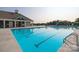 Large community pool with lane markers and lounge chairs at 1344 Secrest Commons Ct, Monroe, NC 28112