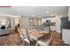 Open concept dining area flows to the kitchen and living room, perfect for entertaining at 1344 Secrest Commons Ct, Monroe, NC 28112