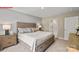 Comfortable main bedroom with a neutral palette and an en-suite bathroom for added privacy at 1344 Secrest Commons Ct, Monroe, NC 28112