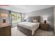 Serene main bedroom with a large window offers natural light and a peaceful retreat at 1344 Secrest Commons Ct, Monroe, NC 28112