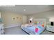 Cozy bedroom with colorful bedding, side tables, and a window at 1353 Secrest Commons Dr, Monroe, NC 28112