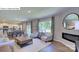Open-concept living room and kitchen area with modern furnishings at 1353 Secrest Commons Dr, Monroe, NC 28112