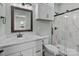 Elegant bathroom with a modern vanity, stylish fixtures, and a glass-enclosed shower with beautiful tile work at 140 Swimmers Ln, Salisbury, NC 28146